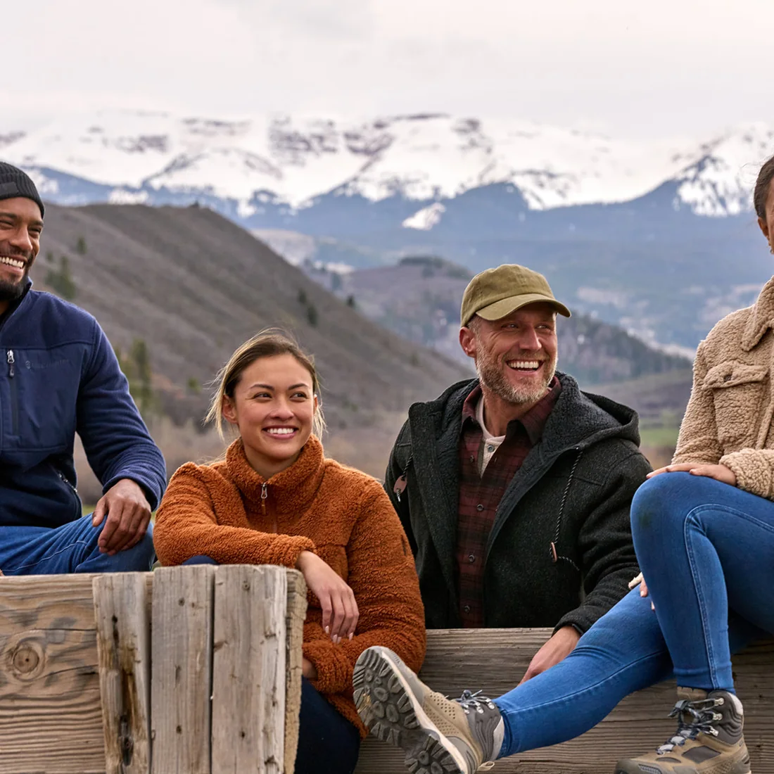 Friends wearing Free Country outdoor layers in the mountains